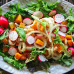 BUTTERNUT SQUASH, BEANS AND ONIONS OVER MIXED GREENS – SALAD
