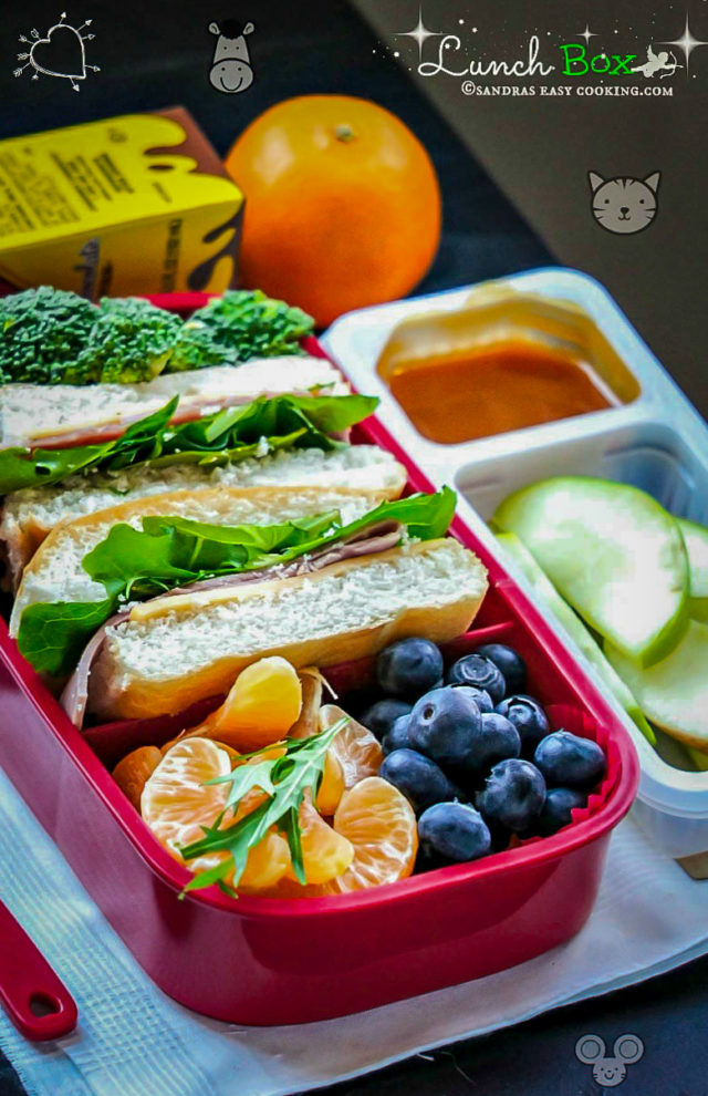 Lunch Box Ham sandwich with Fresh Fruits and Veggies